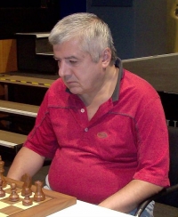 Rafael Vahanyan plays chess with children