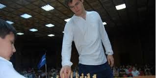 Magnus Carlsen holds simultaneous chess games with young players in Yerevan